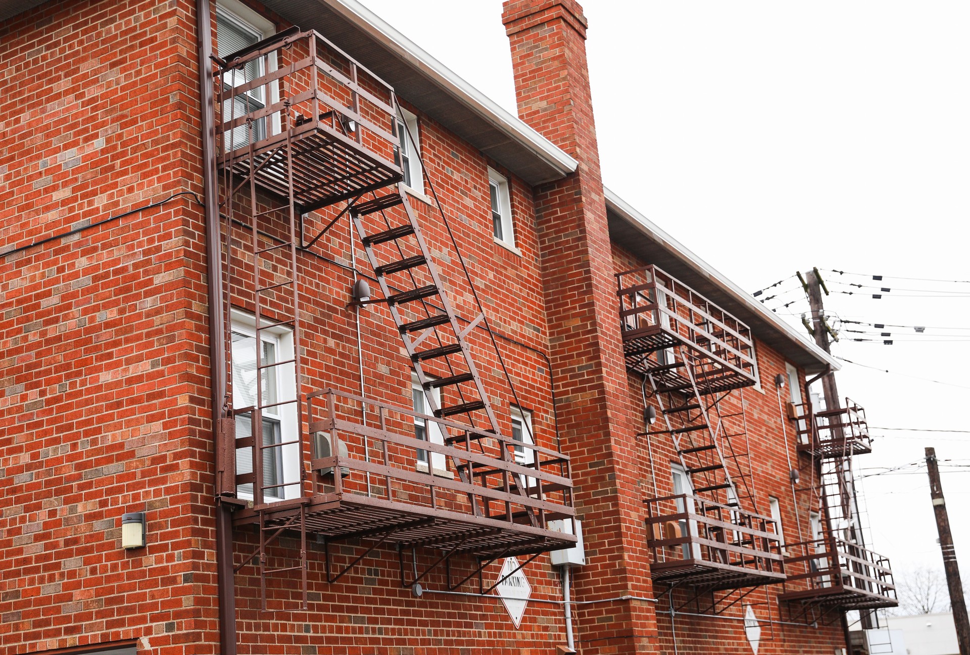 fire escape stairwell on the side of a building, offering a means of evacuation and rescue in case of emergency